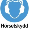 Systemtext Skylt Hörselskydd måste användas 297x210mm